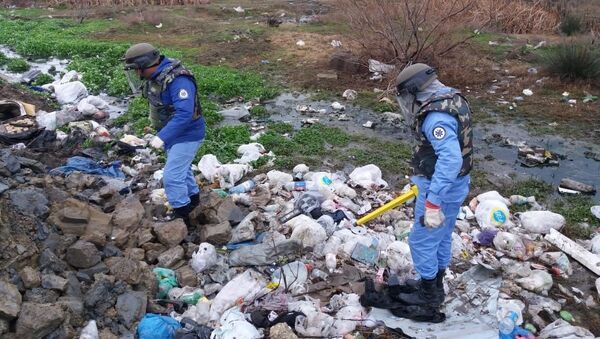 Полиция и саперы ANAMA обнаружили более 700 единиц боеприпасов на автодороге Бильгя-Сумгайыт - Sputnik Азербайджан