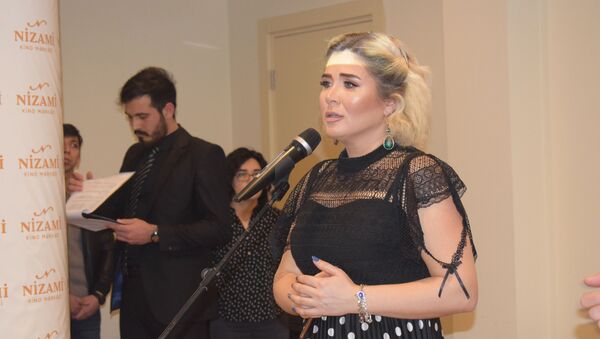 Азербайджанская певица Эльнара Халилова представила клип Justice for Khojaly («Справедливость Ходжалы») на языке жестов - Sputnik Азербайджан