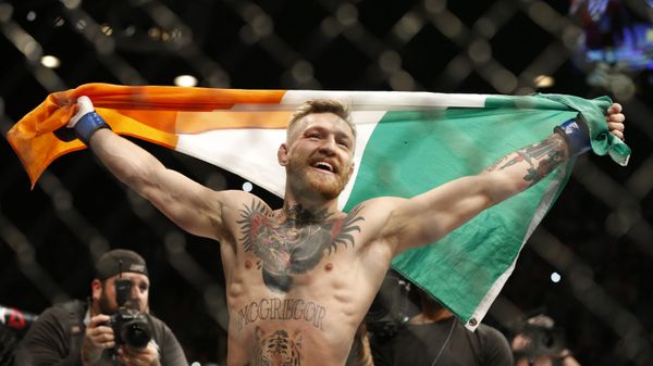 Ирландский боец Конор Макгрегор после победы над Хосе Альдо на UFC в Лас-Вегасе, 2015 год - Sputnik Азербайджан