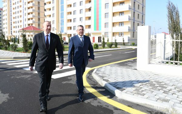 В поселке Кюрдаханы Баку состоялось открытие нового жилого комплекса для семей вынужденных переселенцев - Sputnik Азербайджан