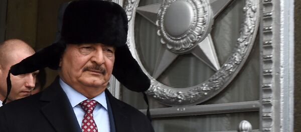 Глава Ливийской национальной армии ливийский маршал Халифа Хафтар покидает главное здание МИД России после встречи с министром иностранных дел России в Москве Глава Ливийской национальной армии ливийский маршал Халифа Хафтар покидает главное здание МИД России после встречи с министром иностранных дел России в Москве - Sputnik Азербайджан