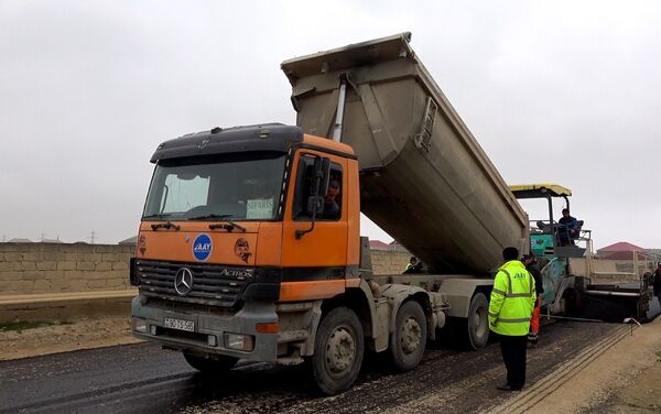 Строительство новой автомобильной дороги в Сураханском районе - Sputnik Азербайджан