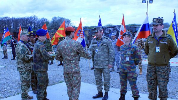 Представители Азербайджанской Армии приняли участие в многонациональных совместных медицинских учениях НАТО - Sputnik Азербайджан