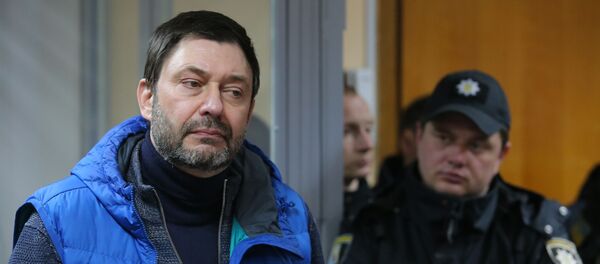 Руководитель портала РИА Новости Украина Кирилл Вышинский в Подольском районном суде (26 марта 2019). Киев - Sputnik Азербайджан
