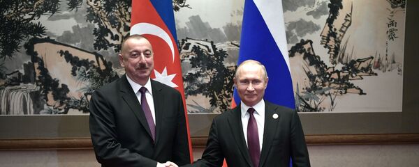 Президент РФ Владимир Путин и президент Азербайджана Ильхам Алиев, фото из архива - Sputnik Азербайджан