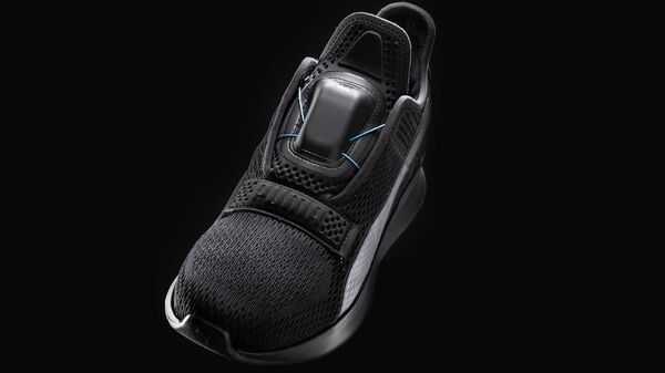 Puma разработали кроссовки, которые завязываются с помощью iPhone Puma разработали кроссовки, которые завязываются с помощью iPhone - Sputnik Азербайджан