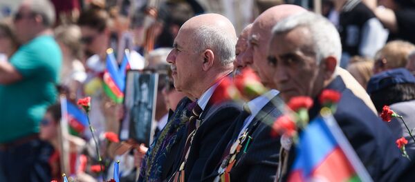Акция Бессмертный полк по случаю 74 годовщины Дня Победы в Баку Акция Бессмертный полк по случаю 74 годовщины Дня Победы в Баку - Sputnik Азербайджан