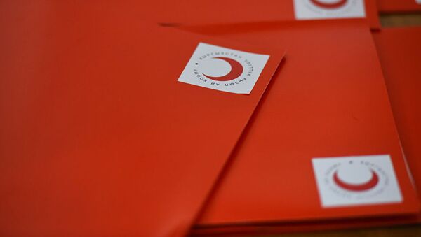 Папка с логотипом общества Красного полумесяца, фото из архива - Sputnik Азербайджан