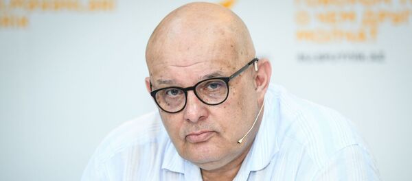 Руководитель учебных программ Международного информационного агентства Россия сегодня Олег Щедров - Sputnik Азербайджан