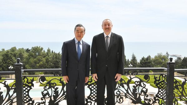 Президент Азербайджана Ильхам Алиев и министр иностранных дел Китайской Народной Республики Ван И - Sputnik Азербайджан