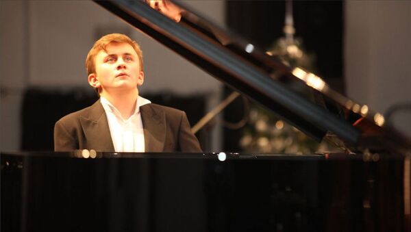 Известный российский пианист, лауреат международных конкурсов, солист Московской государственной академической филармонии Никита Волов - Sputnik Азербайджан