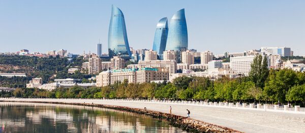 Вид на набережную и башни города Баку Вид на набережную и башни города Баку - Sputnik Азербайджан