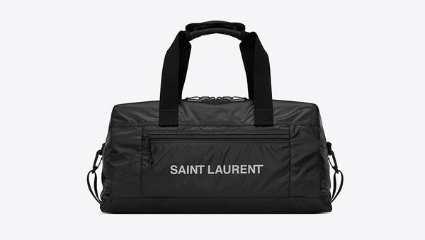Нейлоновая сумка Saint Laurent из линейки NUXX - Sputnik Азербайджан