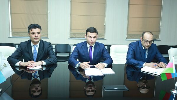 Встреча между руководством Агентства по развитию малого и среднего бизнеса АР и представителями компании Omni World Holdings Limited (ОАЭ) - Sputnik Азербайджан