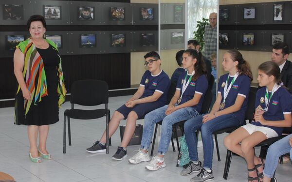 В РИКЦ прошла встреча с юными спортсменами из Азербайджана, которые приняли участие в V Всемирных играх юных соотечественников - Sputnik Азербайджан
