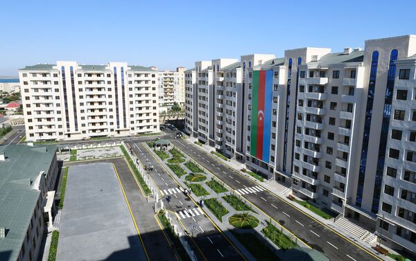 Жилой комплекс для семей вынужденных переселенцев в Пираллахинском районе Баку - Sputnik Азербайджан