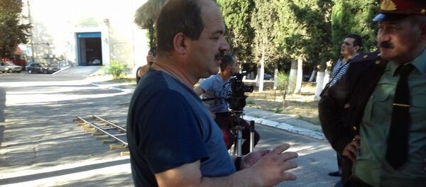 Cəlaləddin Qasımov Şollerin arxivi filminin çəkilişində - Sputnik Азербайджан