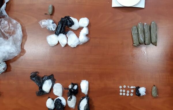 Шоколадное преступление: на границе Азербайджана перехватили наркотики в фантиках Шоколадное преступление: на границе Азербайджана перехватили наркотики в фантиках - Sputnik Азербайджан
