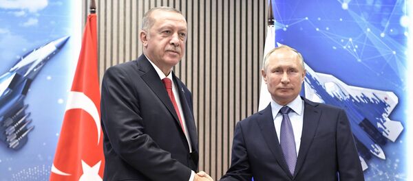 Президенты Турции и России Реджеп Тайип Эрдоган и Владимир Путин, фото из архиваПрезиденты Турции и России Реджеп Тайип Эрдоган и Владимир Путин, фото из архива - Sputnik Азербайджан