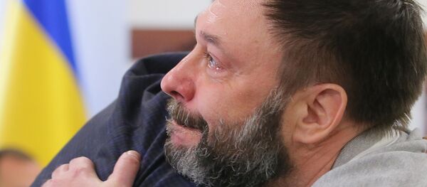 Руководитель портала РИА Новости Украина Кирилл Вышинский после заседания апелляционного суда Киева Руководитель портала РИА Новости Украина Кирилл Вышинский после заседания апелляционного суда Киева - Sputnik Азербайджан