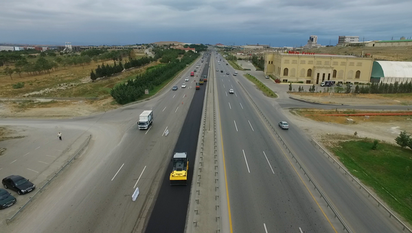 Ремонт на 7-километровом участке автомагистрали Баку-Губа-госграница России между 11-м и 18-м километрами - Sputnik Азербайджан