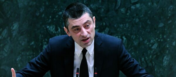 Новый премьер-министр Грузии Георгий Гахария выступает в парламенте в Тбилиси Новый премьер-министр Грузии Георгий Гахария выступает в парламенте в Тбилиси - Sputnik Азербайджан