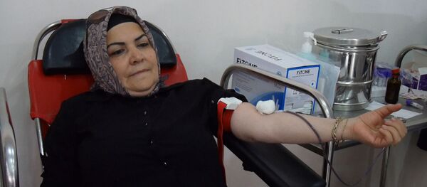 День Ашура в Баку: азербайджанцы помогают тем, кто нуждается в крови - Sputnik Азербайджан