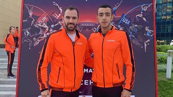Азербайджанский легкоатлет Назим Бабаев и турецкий спортсмен азербайджанского происхождения Рамиль Гулиев - Sputnik Азербайджан