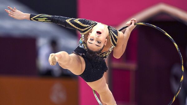 Алина Адильханова (Казахстан)  на чемпионате мира по художественной гимнастике 2019 в Баку - Sputnik Азербайджан