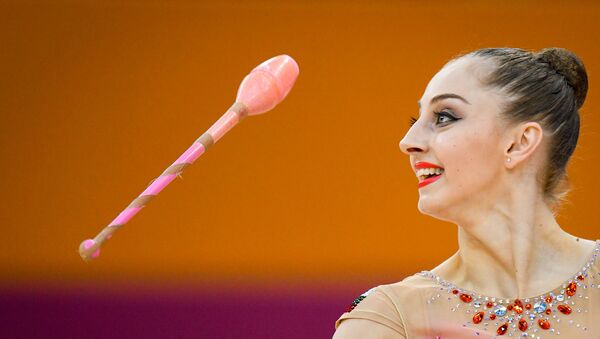 В Баку продолжается настоящий спортивный праздник - 37-й чемпионат мира по художественной гимнастике - Sputnik Азербайджан