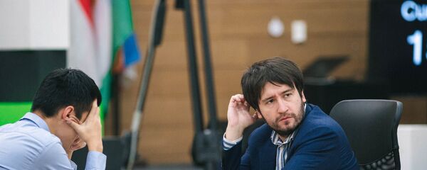  Теймур Раджабов и Дин Лижэнь на Кубка мира в Ханты-Мансийске  - Sputnik Азербайджан