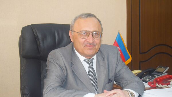 генеральный директор издательства Азербайджан Агабек Аскеров - Sputnik Азербайджан