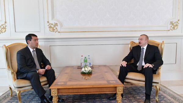 Президент Азербайджана Ильхам Алиев и новый посол Казахстана в Азербайджане Сержан Абдыкаримов - Sputnik Azərbaycan