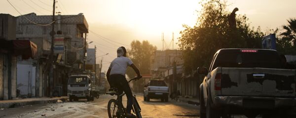 Сирийский пограничный город Тал Абьяд, фото из архива Сирийский пограничный город Тал Абьяд, фото из архива - Sputnik Азербайджан