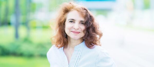 Ведущий научный сотрудник из Института социального анализа и прогнозирования РАНХиГС Юлия Флоринская - Sputnik Азербайджан