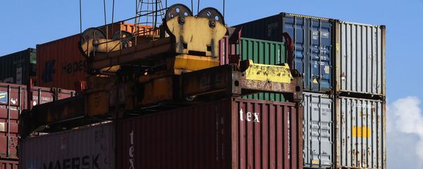 Разгрузка контейнернов, фото из архива Разгрузка контейнернов, фото из архива - Sputnik Азербайджан