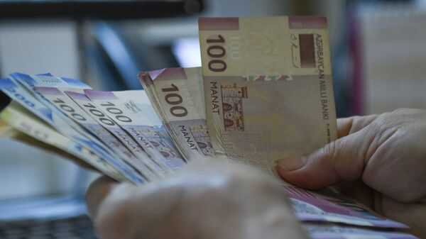 Пересчет денег, фото из архива - Sputnik Azərbaycan