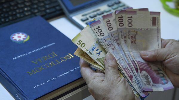 Пересчет денег, фото из архива - Sputnik Azərbaycan