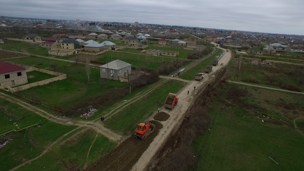 Восемь населенных пунктов на севере Азербайджана соединила асфальтовая дорога Восемь населенных пунктов на севере Азербайджана соединила асфальтовая дорога - Sputnik Азербайджан