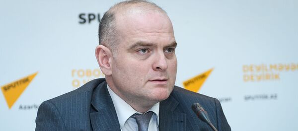 Заместитель директора Русской школы экономики UNEC, доктор наук, профессор Эльшад Мамедов - Sputnik Азербайджан