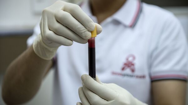Экспресс-анализ крови на ВИЧ-инфекции, фото из архива - Sputnik Азербайджан