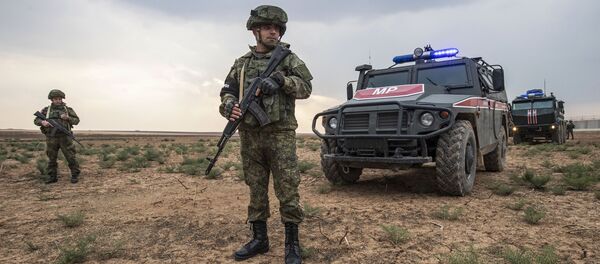 Российские военные в Сирии, фото из архива Российские военные в Сирии, фото из архива - Sputnik Азербайджан