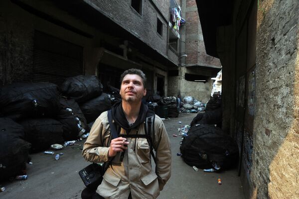 Фотокорреспондент Андрей Стенин на улице Каира - Sputnik Азербайджан
