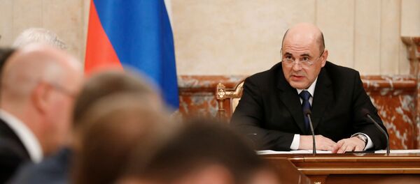 Председатель правительства России Михаил Мишустин на совещании с членами кабинета министров РФ, фото из архива Председатель правительства России Михаил Мишустин на совещании с членами кабинета министров РФ, фото из архива - Sputnik Азербайджан