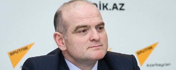 Заместитель директора Русской школы экономики UNEC, доктор наук, профессор Эльшад Мамедов - Sputnik Азербайджан