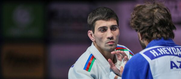 Азербайджанские дзюдоисты Рустам Оруджев и Хидайет Гейдаров, фото из архива - Sputnik Азербайджан