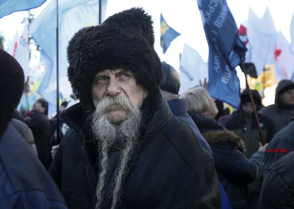 Участник протеста в Киеве, Украина - Sputnik Азербайджан