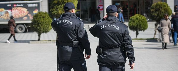 Сотрудник полиции, фото из архива Сотрудник полиции, фото из архива - Sputnik Азербайджан