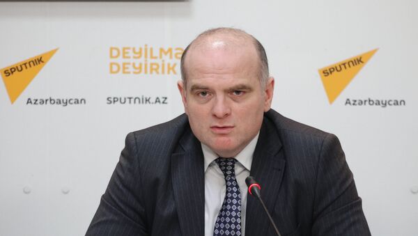 Сюрпризов до конца года не будет: спекуляция вокруг девальвации необоснованна - Sputnik Азербайджан