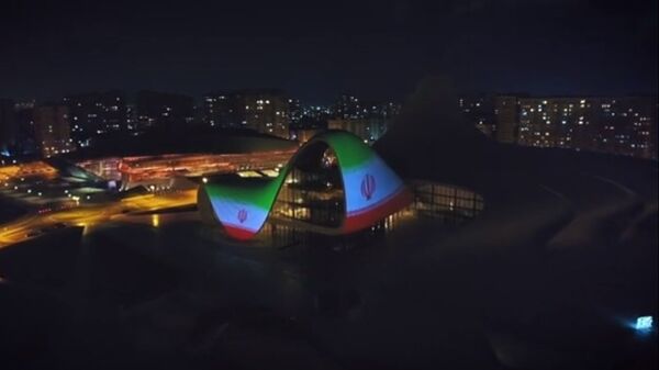 Видеопроекция флага Ирана на Центре Гейдара Алиева в Баку - Sputnik Азербайджан